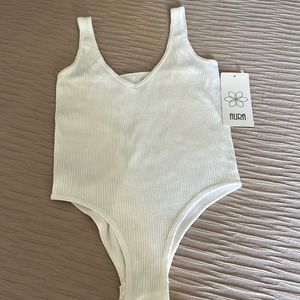 NWT Beautiful Aura Bodysuit in white Size M/L